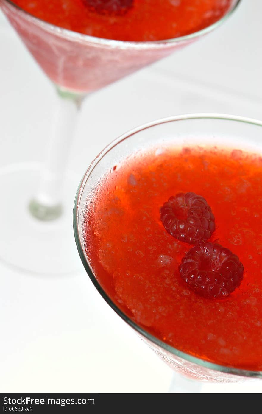 Raspberry Martini on backlit background. Raspberry Martini on backlit background