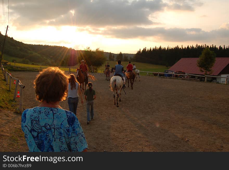 Horsemen came back from a ride. Horsemen came back from a ride.