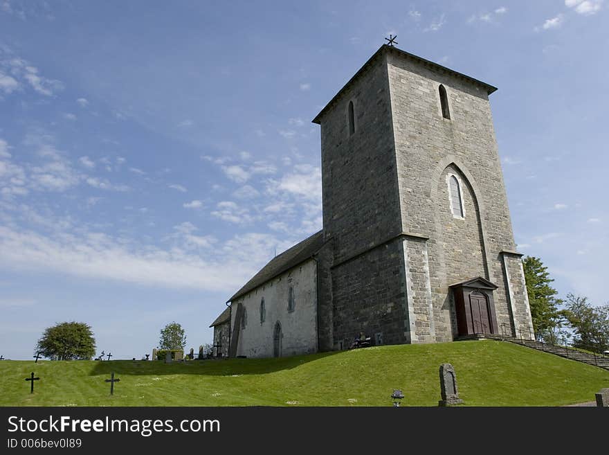 Side of old vintage stone church