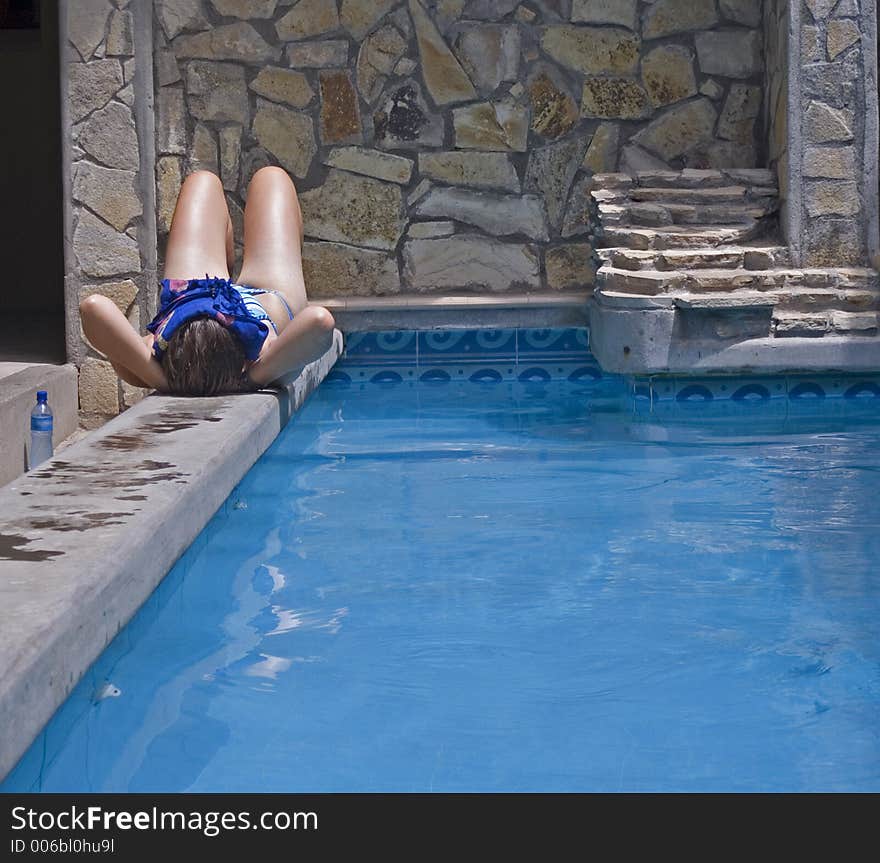 Girl chilling by the pool