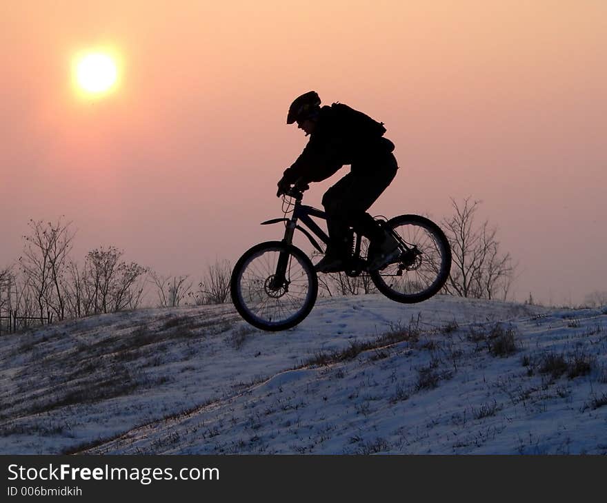 Mountain biker - snowrider. Mountain biker - snowrider