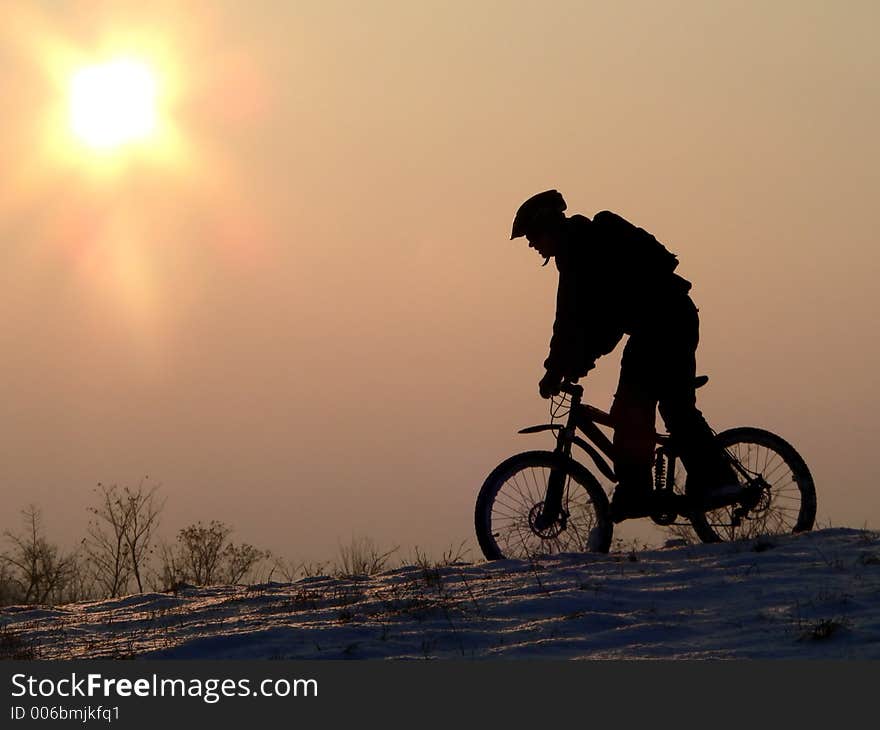 Mountain biker - snowrider. Mountain biker - snowrider