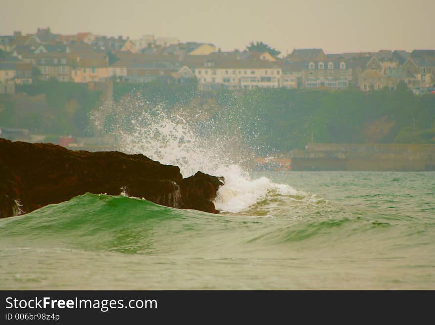 Waves on a beach in Porth Cornwall. Waves on a beach in Porth Cornwall