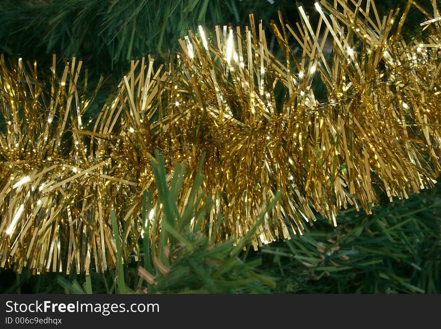 Gold garland decorates the Christmas Tree