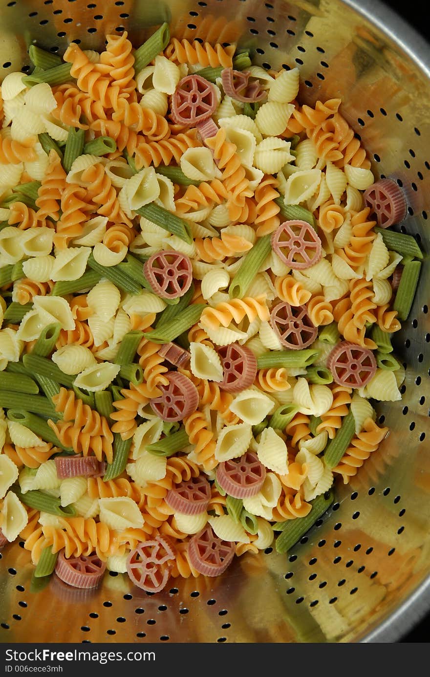 Bowl of mixed color pasta noodles