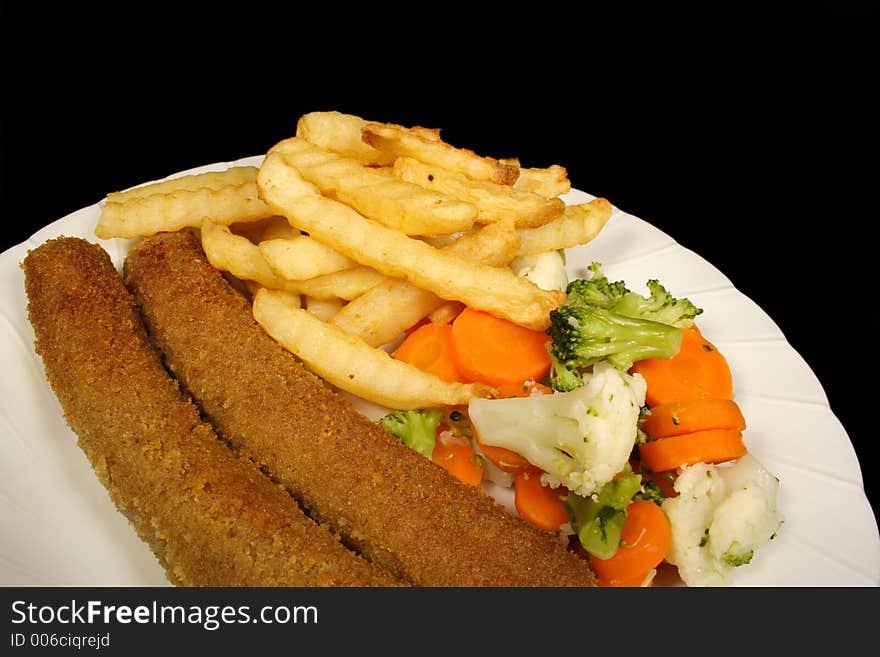 Chips Vegetables and crumbed sausages. Chips Vegetables and crumbed sausages