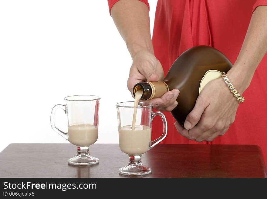 Close-Up Of Woman Pouring Irish Creme Liqueur 1