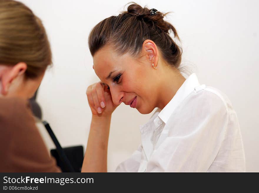 Two females in the office. Two females in the office