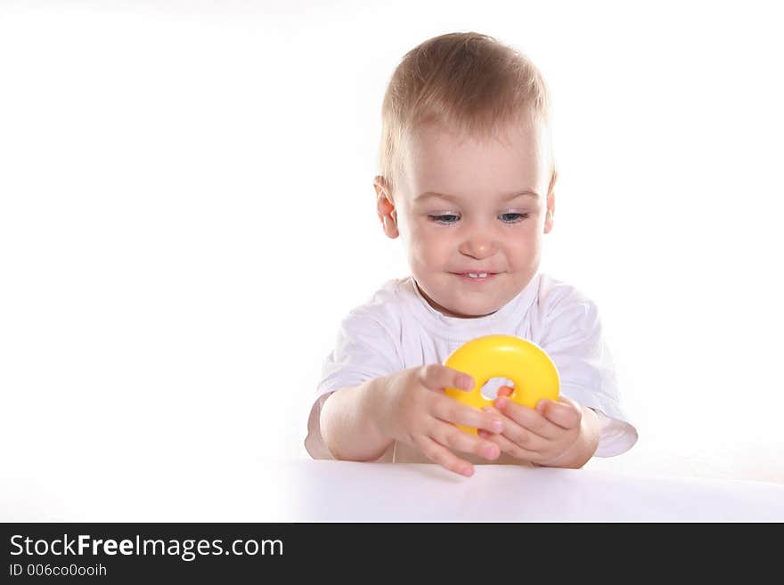 Baby with toy ring