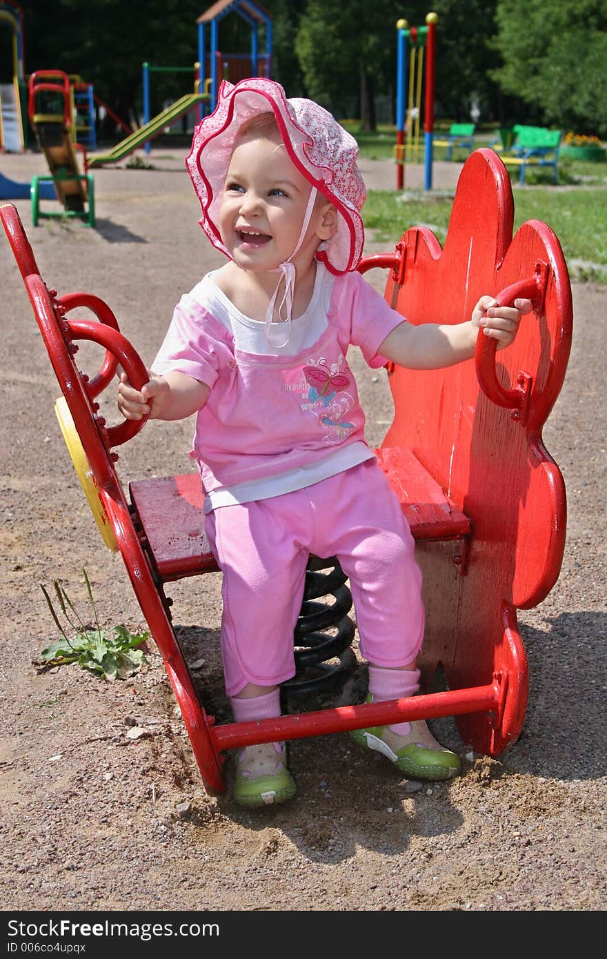 Happy baby in yard