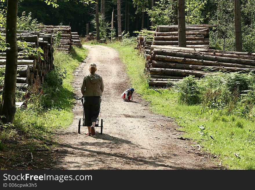 Child and mother  in a forest. Child and mother  in a forest