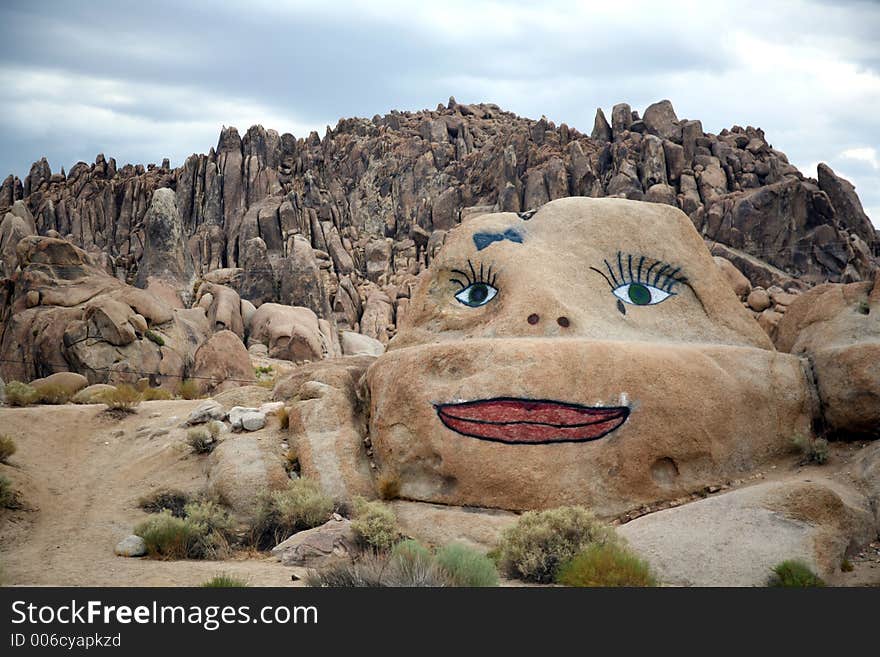 Rock with a smiling face painted on it. Rock with a smiling face painted on it