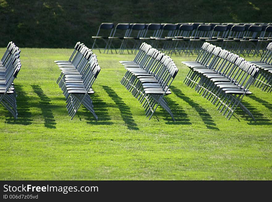 Rows of folding chairs.