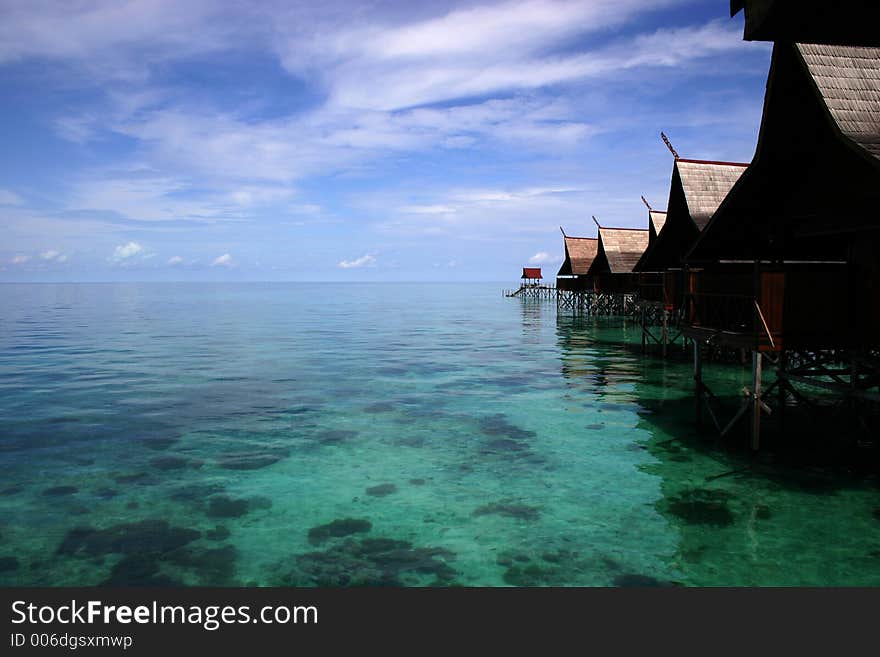 Stilt house on reef