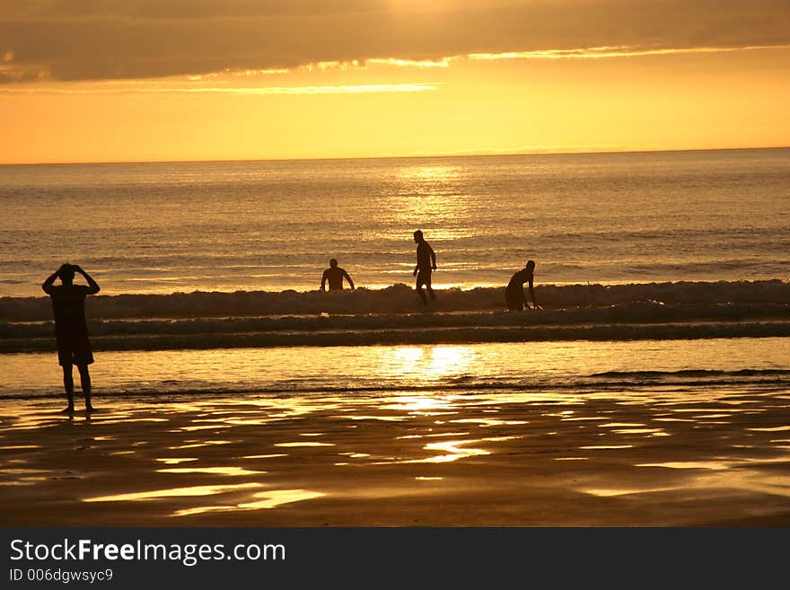 Surfing at sunset. Surfing at sunset