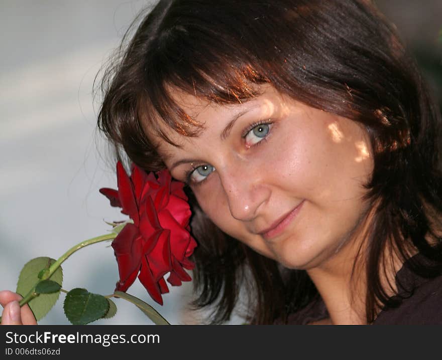 Beautiful young woman with rose. Beautiful young woman with rose