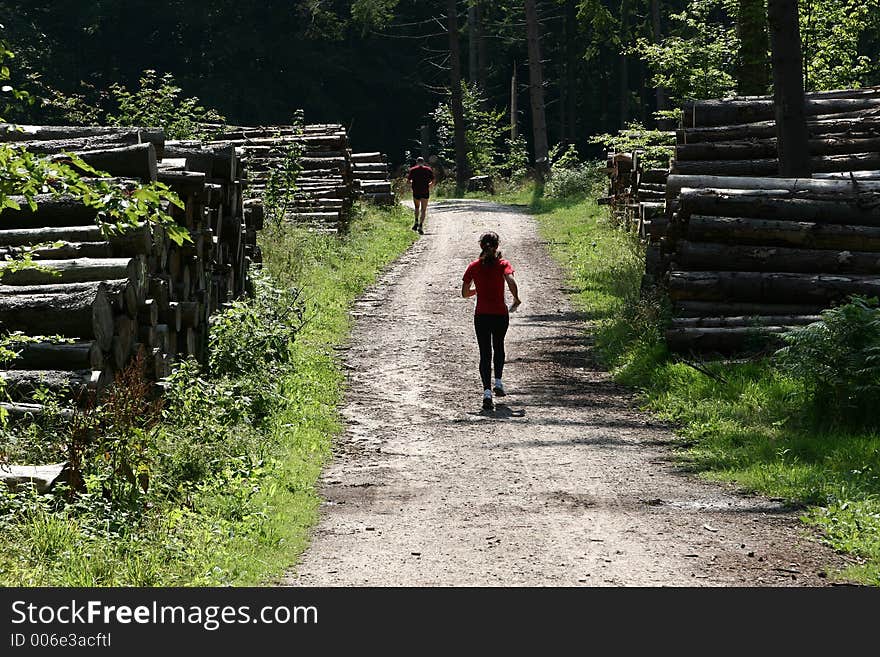 Running on a path in the forest of rudeskov in denmark