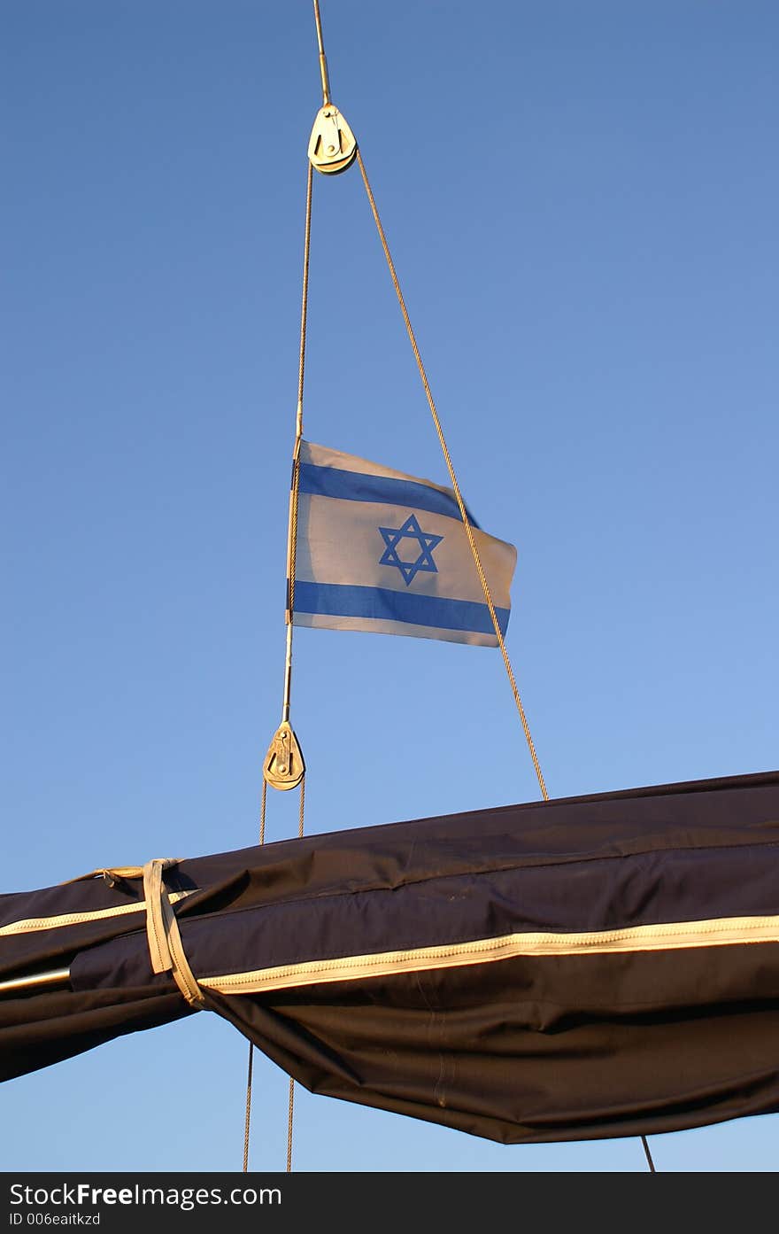 The flag of Israel on a boat in sea. The flag of Israel on a boat in sea