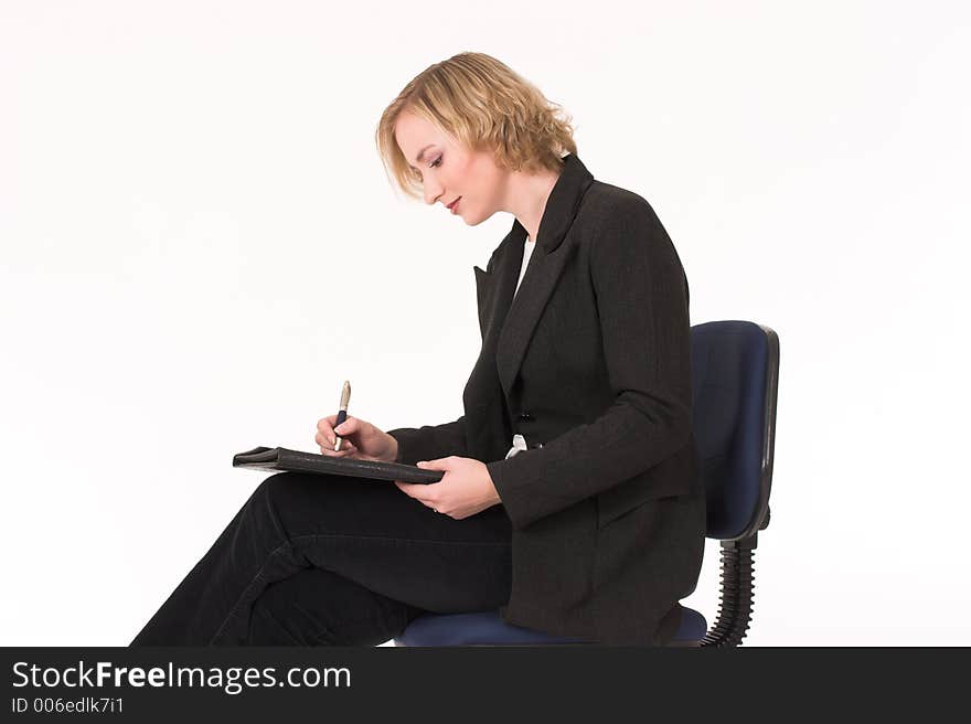 Business woman making notes. Business woman making notes