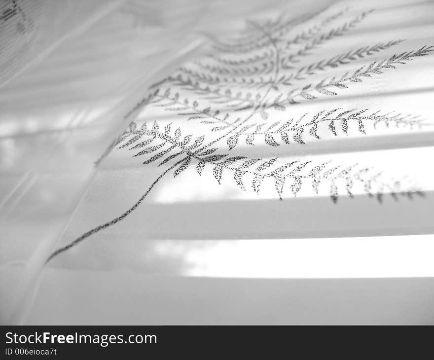 High-key abstract white lace curtain on white blinds background (high-resolution photo). High-key abstract white lace curtain on white blinds background (high-resolution photo)