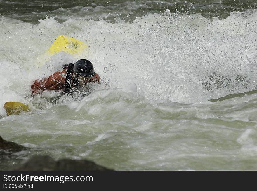 Adventurous Whitewater Kayaker in Rapids