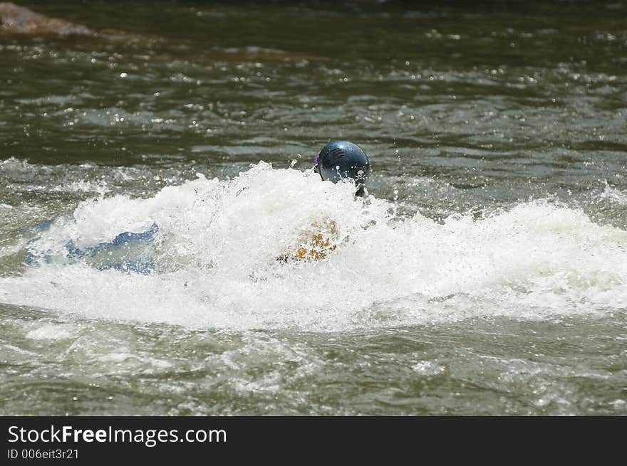 Adventurous Whitewater Kayaker in Rapids