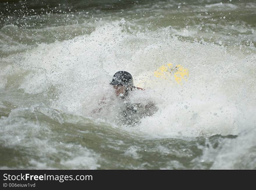 Adventurous Whitewater Kayaker in Rapids