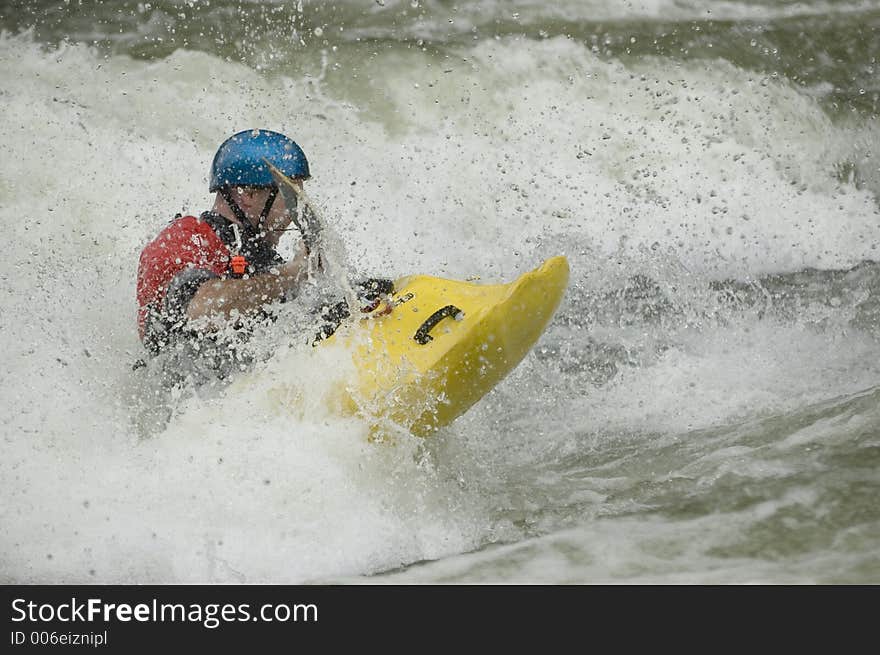 Adventurous Whitewater Kayaker in Rapids