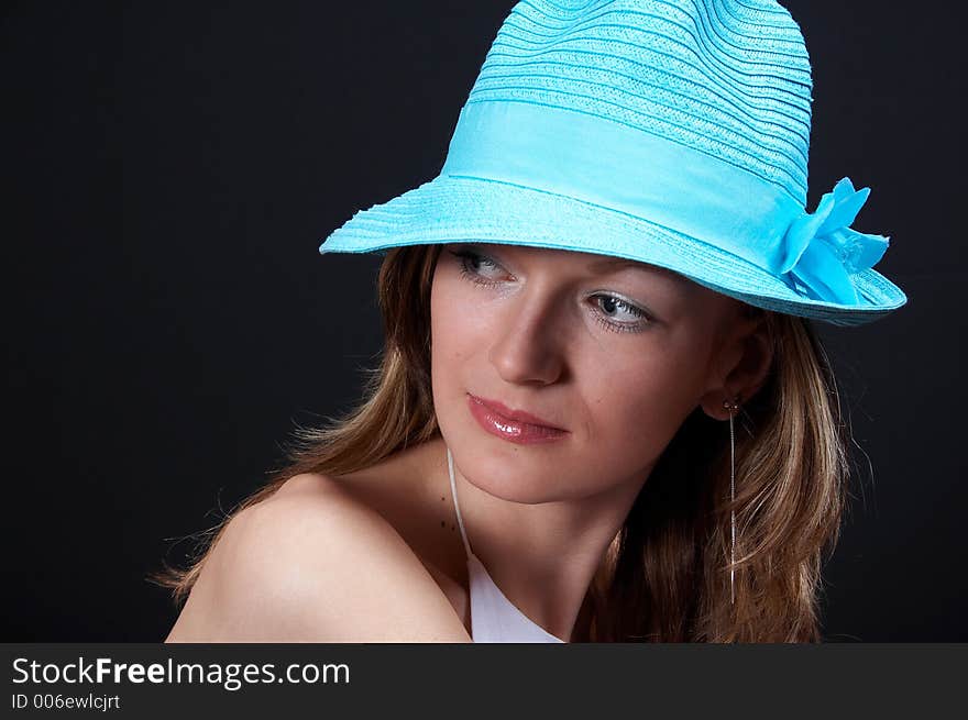 Young blonde girl with hat, close-up. Young blonde girl with hat, close-up