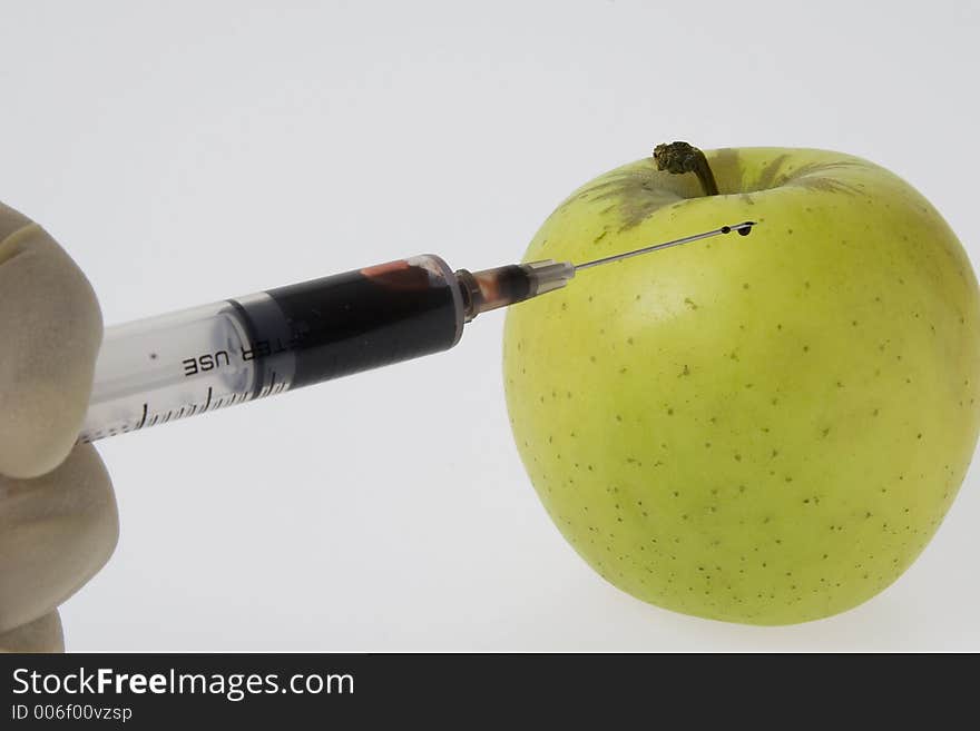 Injection into apple. Injection into apple