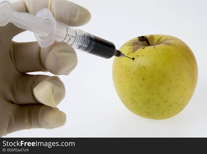 Injection into apple. Injection into apple