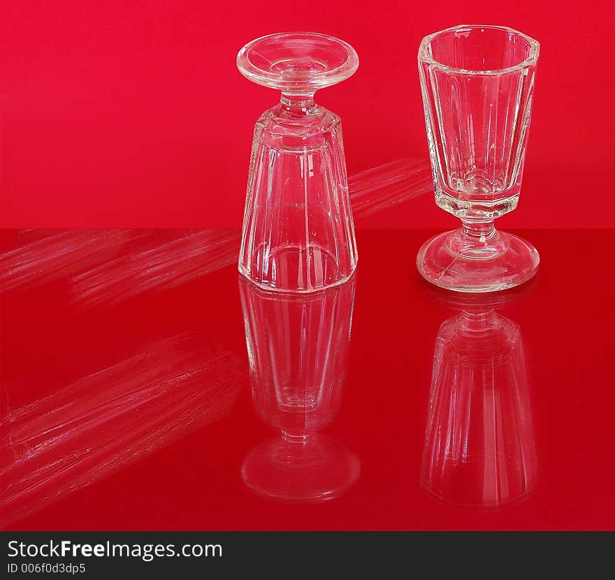 Liqueur glass on red background