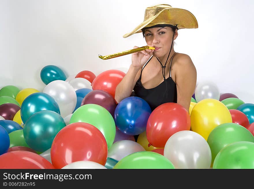 Smiled girl in colorful baloons