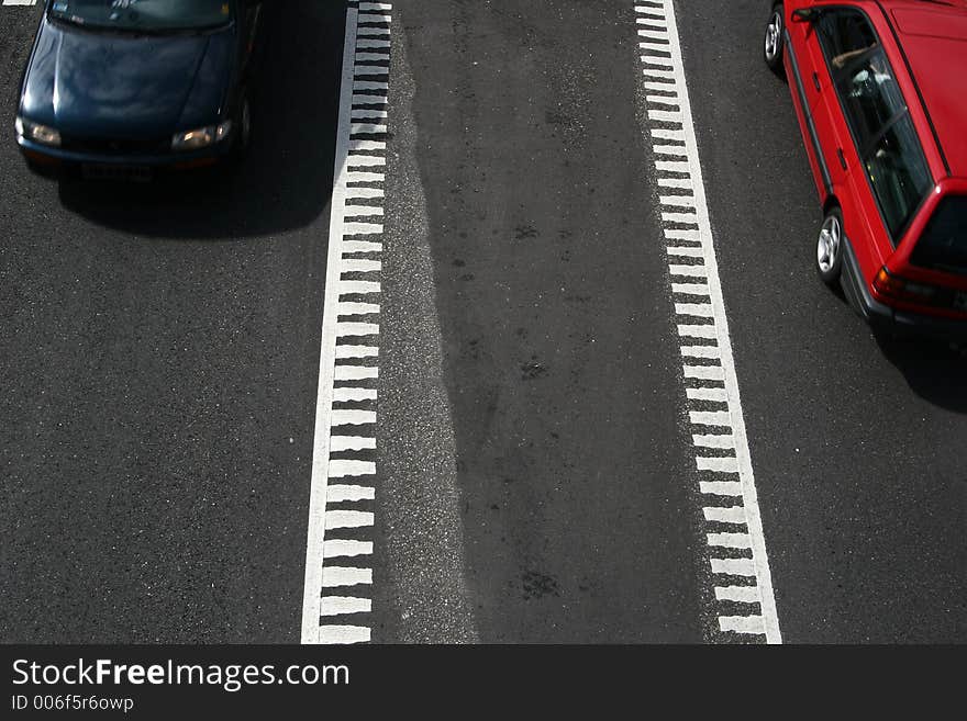 Traffic  on a street in denmark, shot from above (a bridge) with low shutter speed