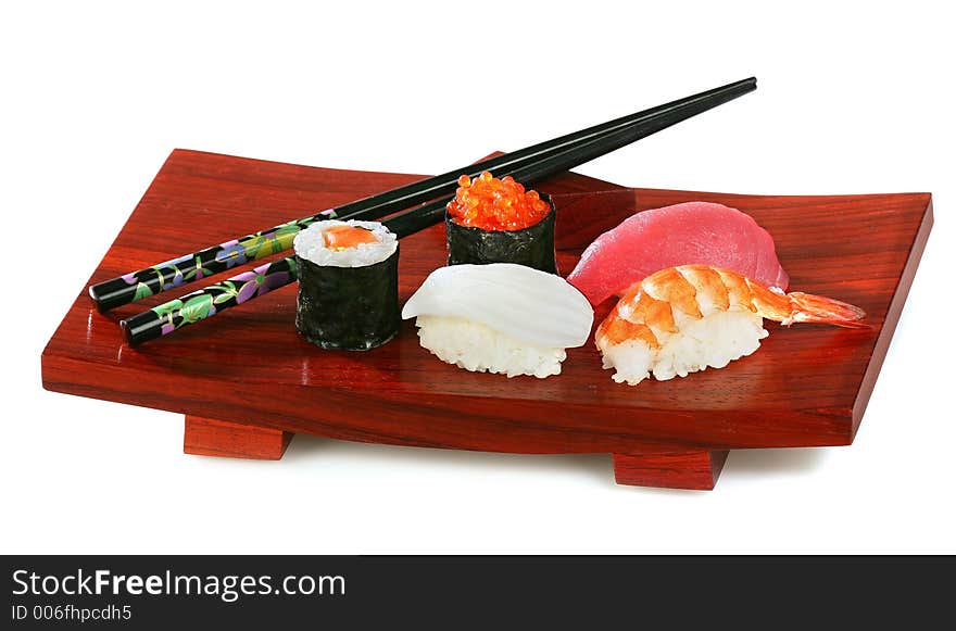 Sushi on wooden plate