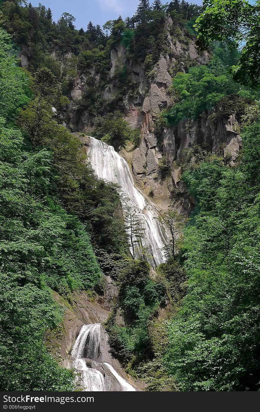 The faterfall in the mountains. The faterfall in the mountains