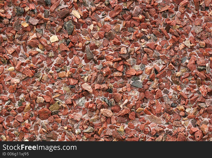 A red rock texture on a wall