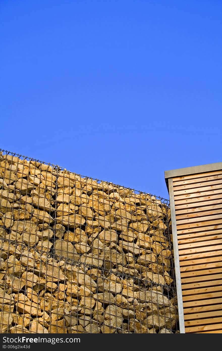 Stone wall and wooden front