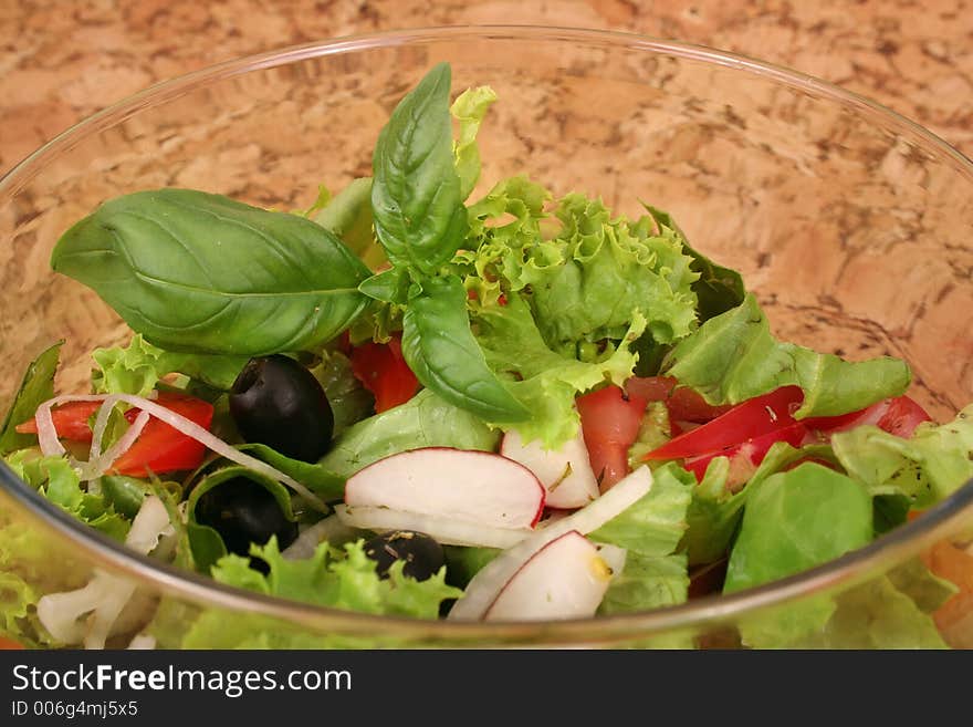 Salad bowl with fresh salad and tomato. Salad bowl with fresh salad and tomato