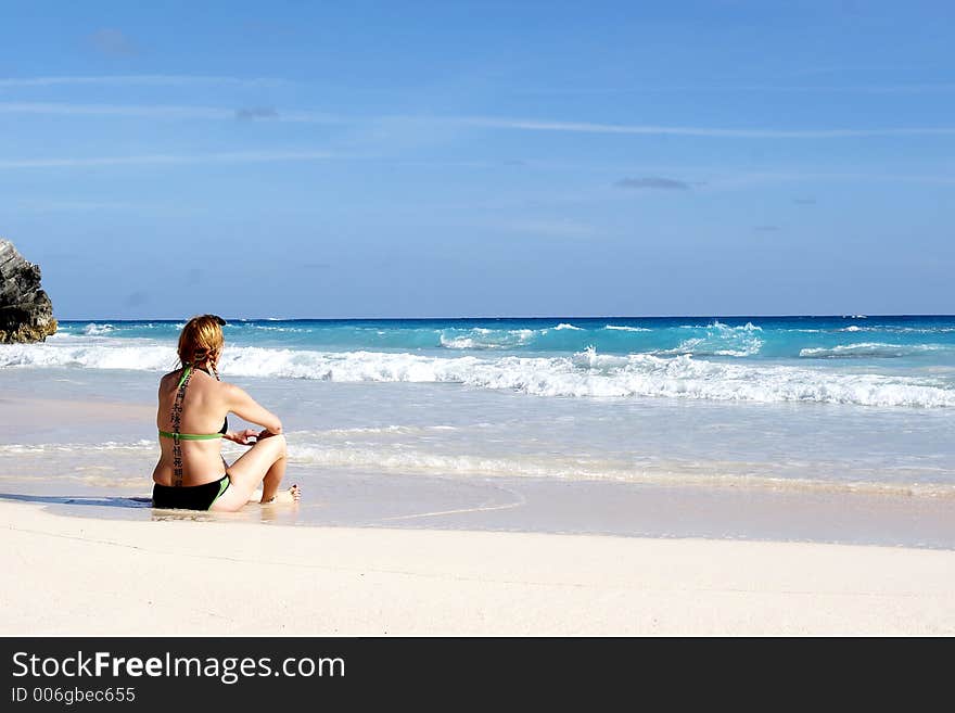 Sitting on the beach. Sitting on the beach