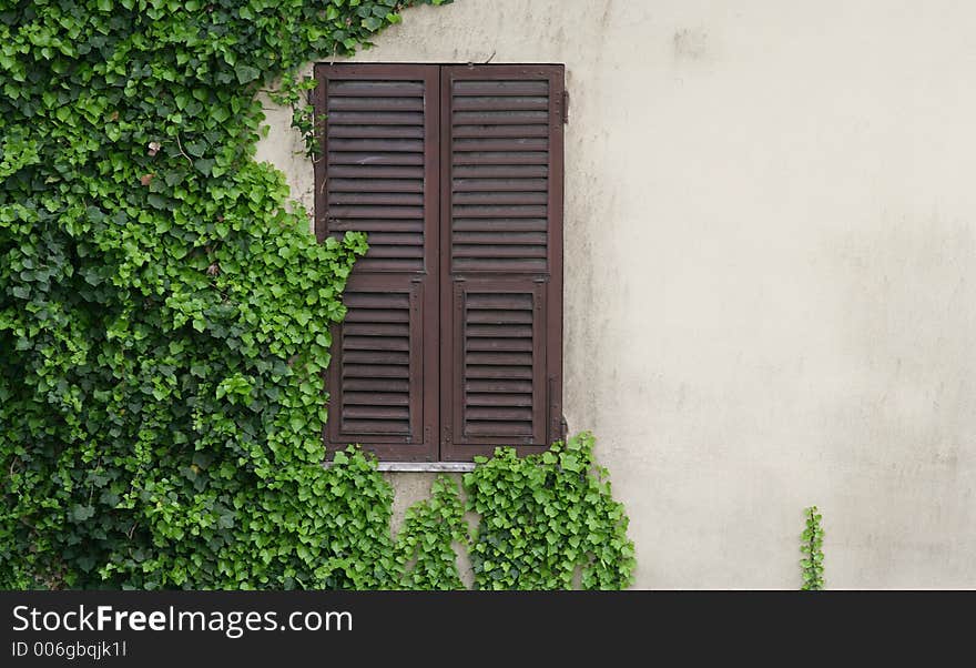 Alone window on the corner wall