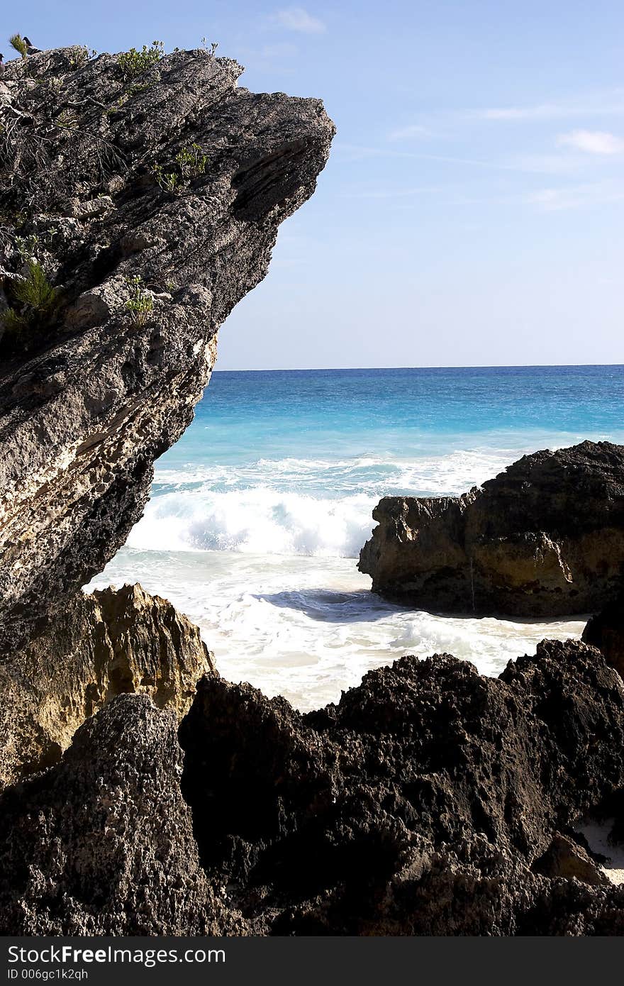 Lava rocks and blue ocean waters. Lava rocks and blue ocean waters