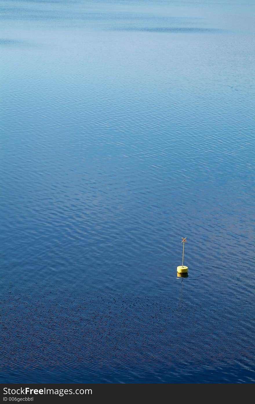 Yellow buoy in the water