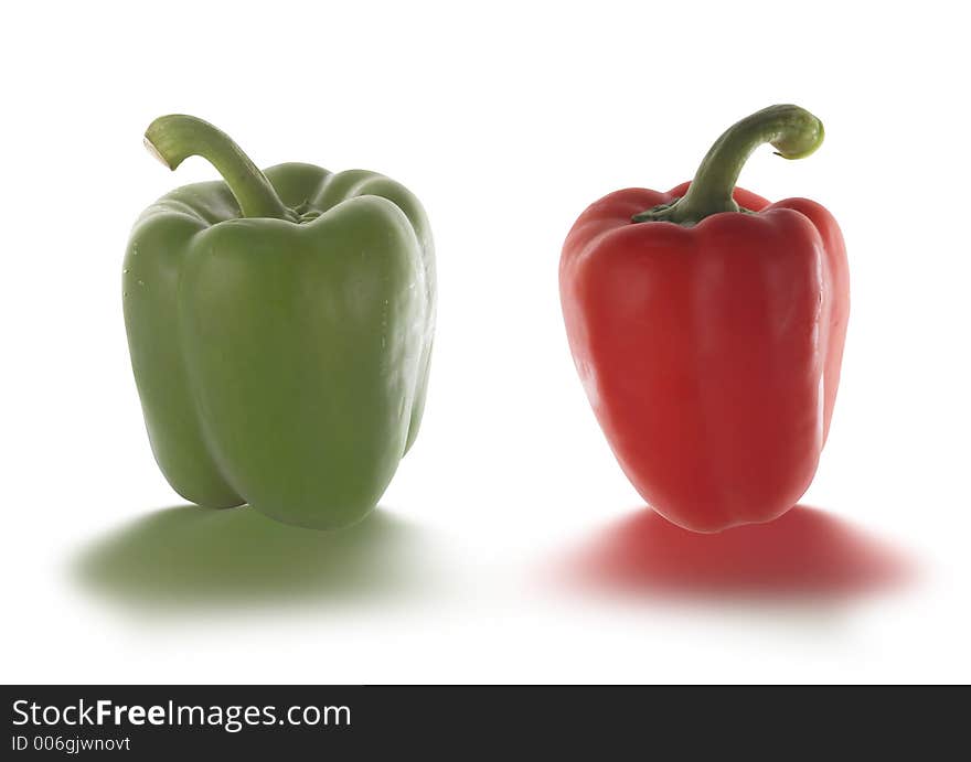 Red and green pepper isolated on white