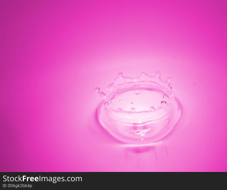 Waterdrop seen through a macro lens with lemonade color. Waterdrop seen through a macro lens with lemonade color