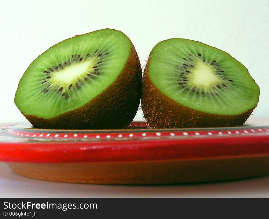 Kiwi on a red plate