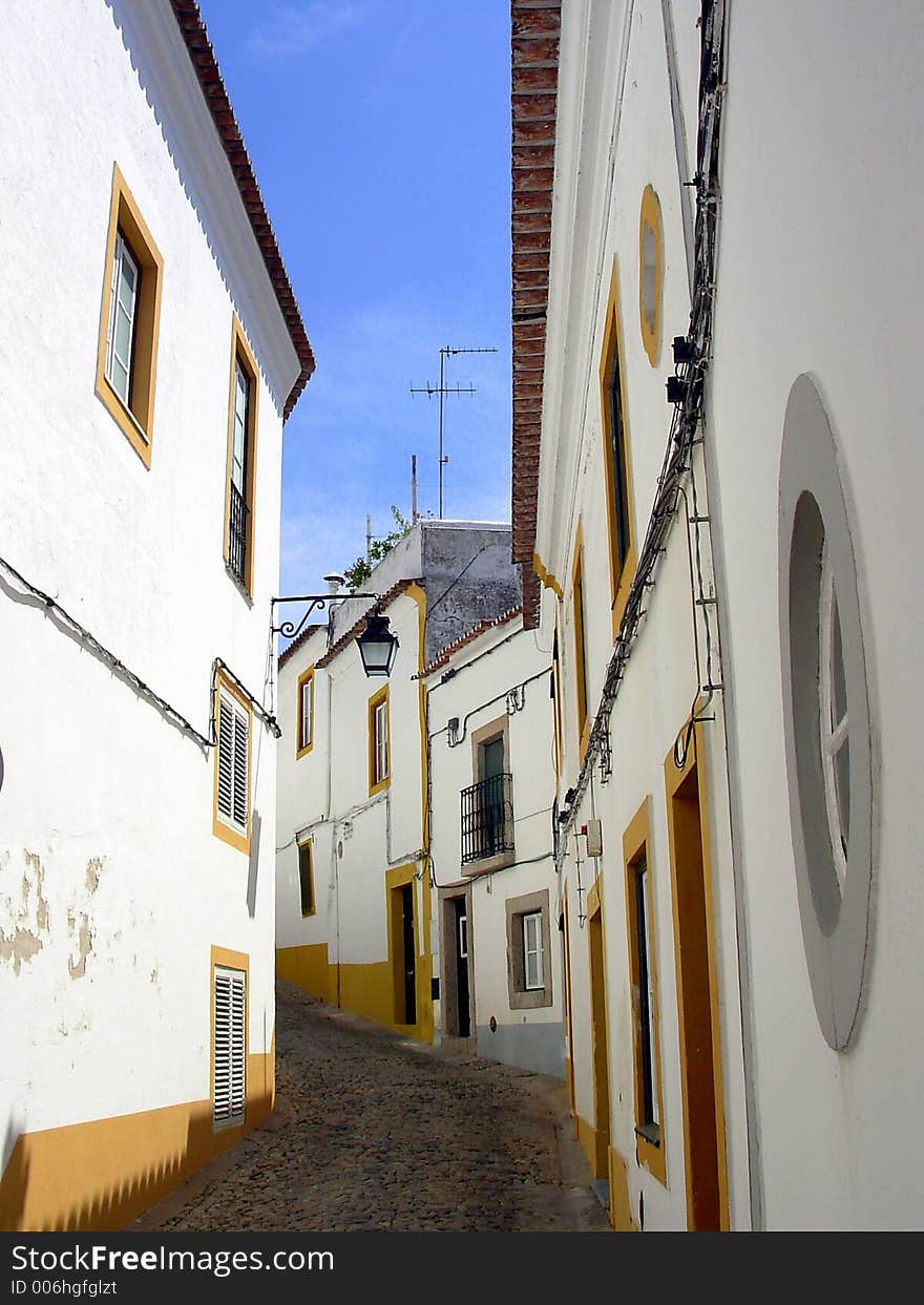 Street of the city of Évora capital of the Alentejo region to the South of Portugal, considered patrimonio of the Humanity for UNESCO since 1986. Street of the city of Évora capital of the Alentejo region to the South of Portugal, considered patrimonio of the Humanity for UNESCO since 1986.