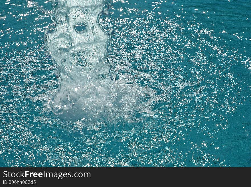 Swirl and waterfall in a swimming pool