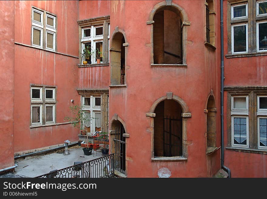 The Hotel Tour Rose has a beautiful tour rose (pink tower) in the inner courtyard called traboule. it is a typical architecture of the XVI century in Lyon. The Hotel Tour Rose has a beautiful tour rose (pink tower) in the inner courtyard called traboule. it is a typical architecture of the XVI century in Lyon.