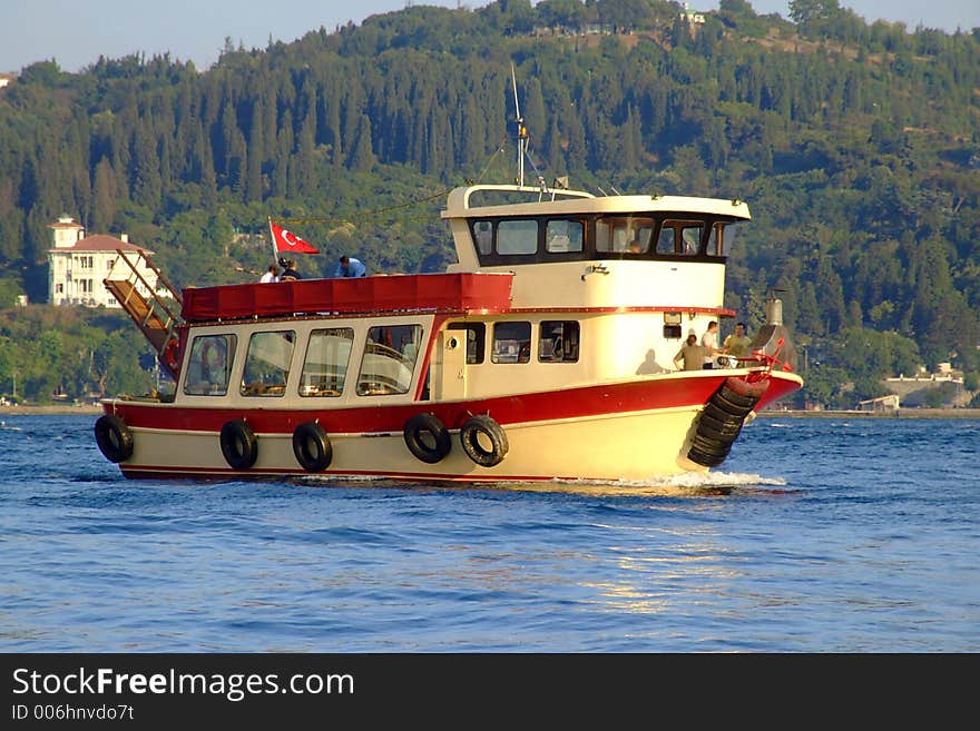 A touristic sight-seeing boat on Bosphorus. A touristic sight-seeing boat on Bosphorus